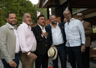 Guests enjoying Arturo Fuente cigars at Xtravaganza 2025 charity event at Hudson Farm Club in Hopatcong, NJ.