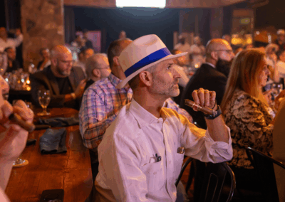 Guests enjoying Arturo Fuente cigars at Xtravaganza 2025 charity event at Hudson Farm Club in Hopatcong, NJ.